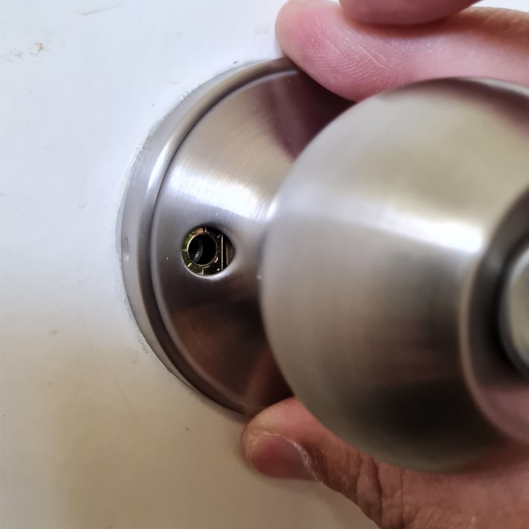 Align cover flange with mounting post