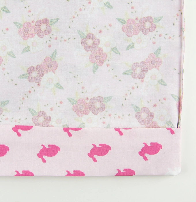 Folded edge is even with the seam between the dress and the dress band