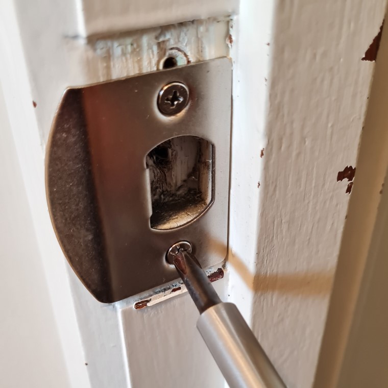 Install new striker plate