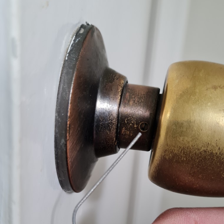 Locate door handle release latch