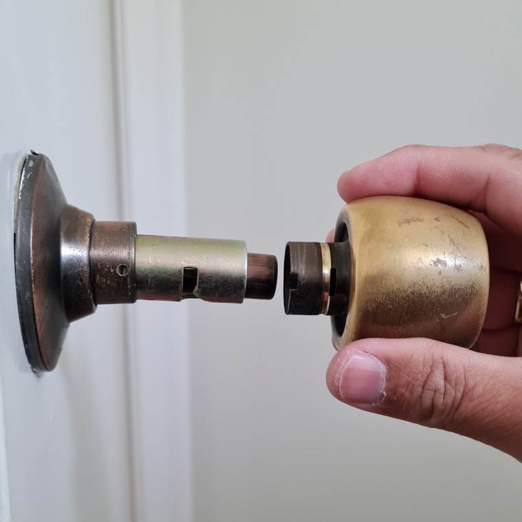 Pull away door knob