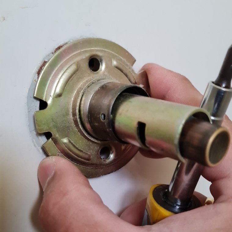 Remove metal plate from door