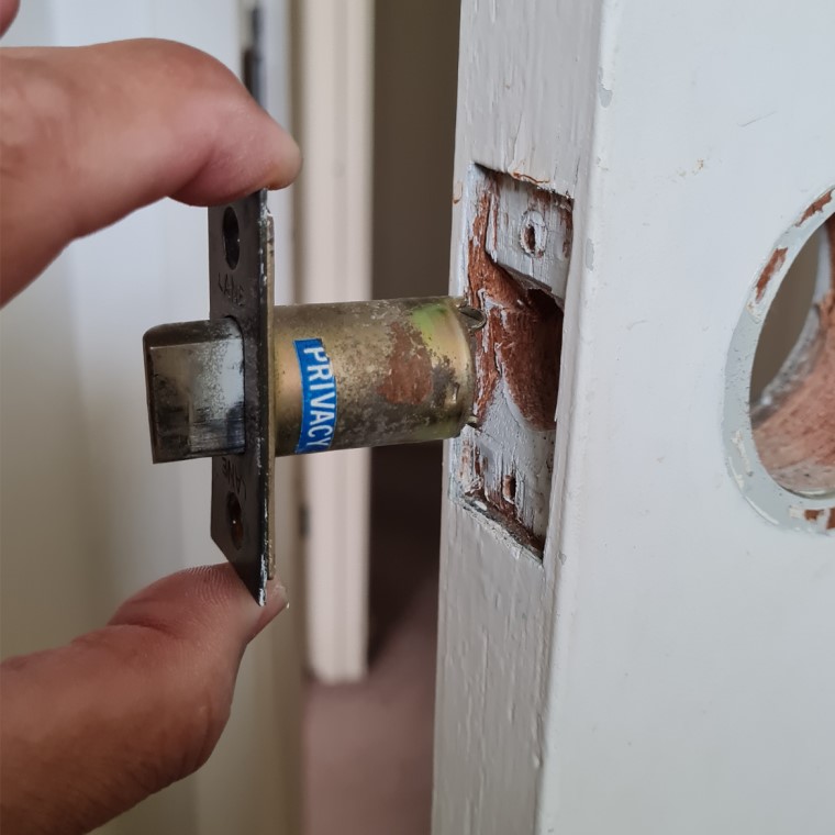Remove old door latch