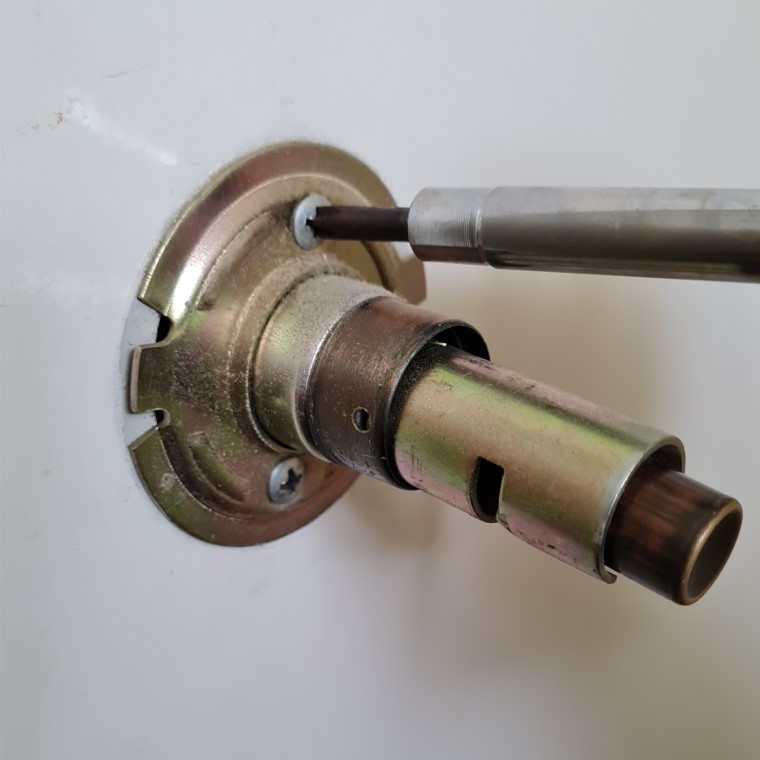 Remove screws from metal plate