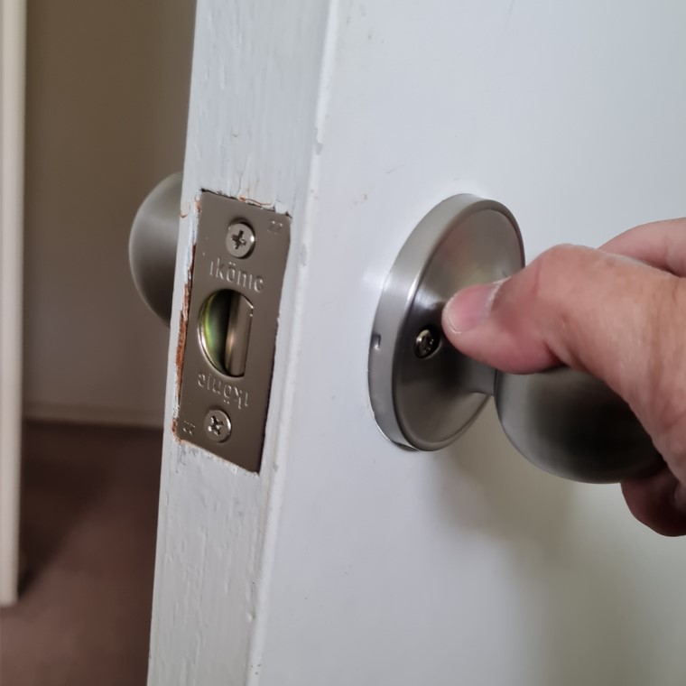 Turn door knob to test